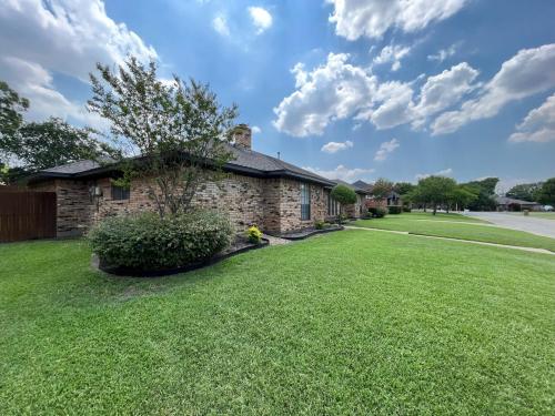 Exterior view, Highland Village, TX. Charming mid-century ranch. in Lake Dallas Exterior view, Highland Village, TX. Charming mid-century ranch. in Lake Dallas