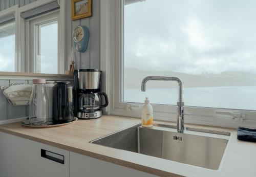 מתקני המלון, Cozy 2-bedroom house with a fantastic view in Hósvík מתקני המלון, Cozy 2-bedroom house with a fantastic view in Hósvík