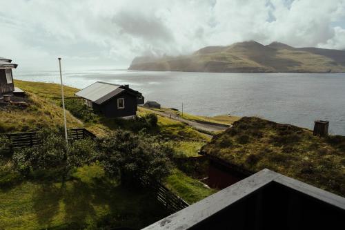 נוף, Cozy 2-bedroom house with a fantastic view in Hósvík נוף, Cozy 2-bedroom house with a fantastic view in Hósvík