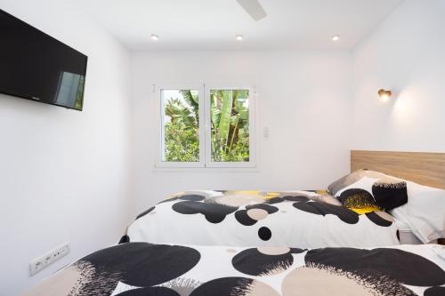 VILLA URBANIA Atico Deluxe By Sunkeyrents