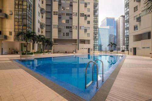 Swimming pool, 2 BR loft-type condo Fort Victoria near SM Aura Premier Swimming pool, 2 BR loft-type condo Fort Victoria near SM Aura Premier