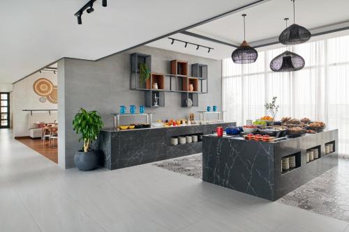 Restaurant, Mövenpick Hotel Jumeirah Village Triangle near Jumeirah Village Triangle Restaurant, Mövenpick Hotel Jumeirah Village Triangle near Jumeirah Village Triangle