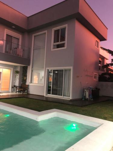 Casa Luxo com piscina a 500 metros da praia in Cachoeira do Bom Jesus Casa Luxo com piscina a 500 metros da praia in Cachoeira do Bom Jesus