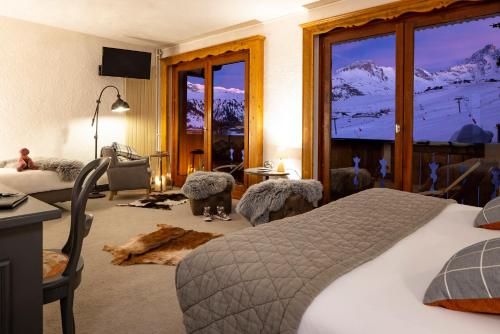 Balcony/terrace, Hotel Courcheneige in Jardin Alpin Balcony/terrace, Hotel Courcheneige in Jardin Alpin