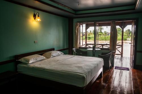 Cảnh quan, Nongsak Guesthouse and Restaurant in Don Khone Cảnh quan, Nongsak Guesthouse and Restaurant in Don Khone