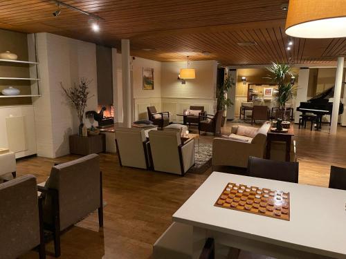 Pub/salon, Fletcher Hotel-Restaurant Wolfheze in Wolfheze Pub/salon, Fletcher Hotel-Restaurant Wolfheze in Wolfheze