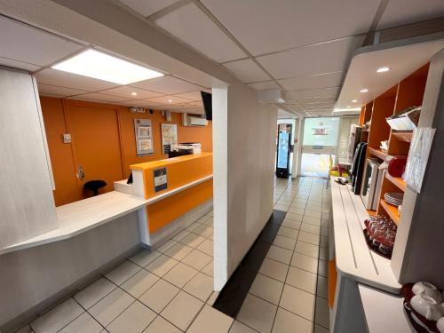 Aufenthaltsraum/TV-Zimmer, Premiere Classe Epinay Sur Orge in Morangis Aufenthaltsraum/TV-Zimmer, Premiere Classe Epinay Sur Orge in Morangis