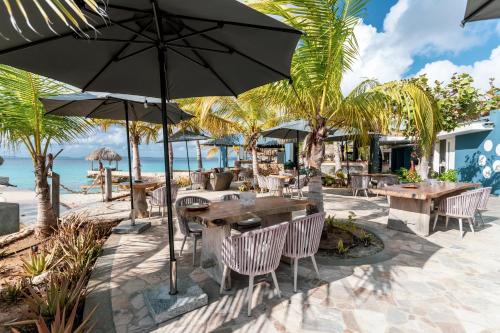 Restaurant, Delfins Beach Resort Bonaire, Tapestry Collection by Hilton in Kralendijk Restaurant, Delfins Beach Resort Bonaire, Tapestry Collection by Hilton in Kralendijk