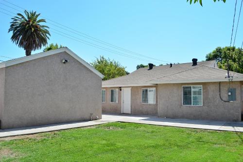 This photo about Anaheim Beacon House: 4 Bedroom, 2 Bath, 2 Car garage shared on HyHotel.com