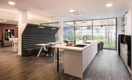 廚房, elaya hotel augsburg in 奧格斯堡格金根 廚房, elaya hotel augsburg in 奧格斯堡格金根