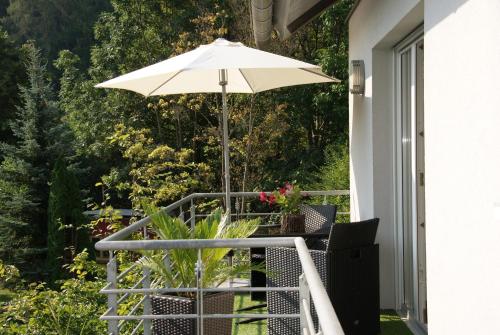 Erkély/terasz, Ferienwohnung Sternenwald in Alf Erkély/terasz, Ferienwohnung Sternenwald in Alf