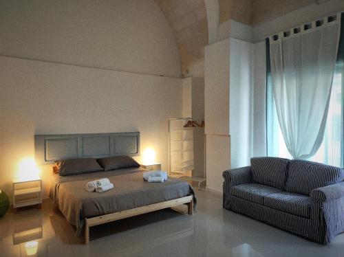 Guestroom, La Piazza in San Giorgio Ionico Guestroom, La Piazza in San Giorgio Ionico