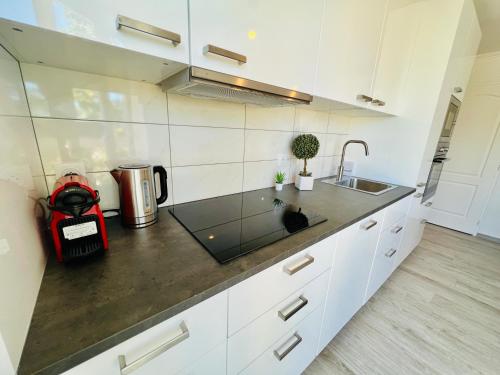 Kitchen, Appartement luxueux et cosy in Cergy Kitchen, Appartement luxueux et cosy in Cergy