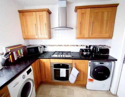 Kitchen, Lancaster House - Entire 4Bed House Serviced Accommodation Newcastle FREE WIFI & FREE 1 OFF STREET P in Newcastle Airport and Nearby Kitchen, Lancaster House - Entire 4Bed House Serviced Accommodation Newcastle FREE WIFI & FREE 1 OFF STREET P in Newcastle Airport and Nearby