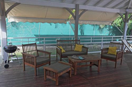 Pub/salon, Villa Outremer - En bord de plage in Mare Gaillard Pub/salon, Villa Outremer - En bord de plage in Mare Gaillard