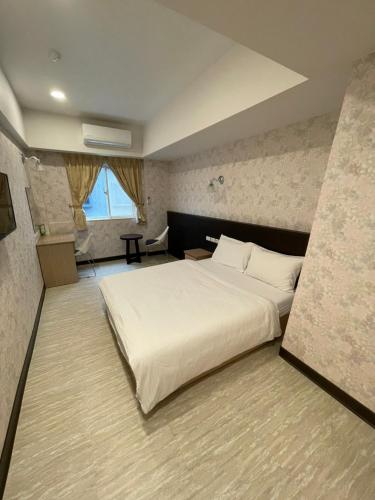 Bed, 苓旅-站前 Lin Inn TMS in Taipei Bed, 苓旅-站前 Lin Inn TMS in Taipei