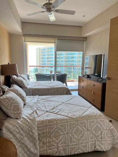 Beachfront Condo DelCanto Resort in นูโว วอลลาร์ต้า Beachfront Condo DelCanto Resort in นูโว วอลลาร์ต้า