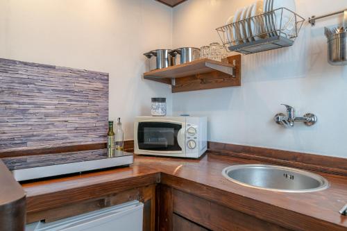 Konyha, 50 négyzetméteres, 1 hálószobás Apartman 1 fürdőszobával Erba területén (Bilocale blue relax) in Erba Konyha, 50 négyzetméteres, 1 hálószobás Apartman 1 fürdőszobával Erba területén (Bilocale blue relax) in Erba