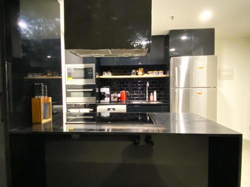 キッチン, 2 Bed 2 Bath Luxury Apartment in Belconnen Canberra - Free heated pool, parking near National Dinosaur Museum キッチン, 2 Bed 2 Bath Luxury Apartment in Belconnen Canberra - Free heated pool, parking near National Dinosaur Museum
