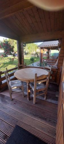 Balcony/terrace, Ruime romantische blokhut in Zwaanshoek Balcony/terrace, Ruime romantische blokhut in Zwaanshoek