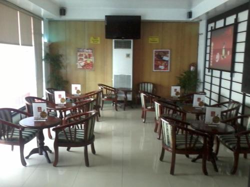 Shared lounge/TV area, Hotel Sogo Edsa Harrison near Embassy of Japan Shared lounge/TV area, Hotel Sogo Edsa Harrison near Embassy of Japan