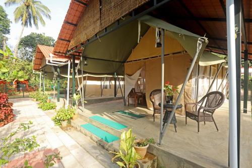 Balcony/terrace, Devi Villa - Plantation Retreat and Forest Getaway in Nagarhole Balcony/terrace, Devi Villa - Plantation Retreat and Forest Getaway in Nagarhole