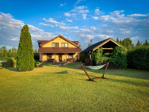 A szálláshely kívülről, Prosportówek - Powidz - Dom Bliźniak nad Jeziorem z Dużym Ogrodem (Prosportowek - Powidz - Dom Blizniak nad Jeziorem z Duzym Ogrodem) in Powidz A szálláshely kívülről, Prosportówek - Powidz - Dom Bliźniak nad Jeziorem z Dużym Ogrodem (Prosportowek - Powidz - Dom Blizniak nad Jeziorem z Duzym Ogrodem) in Powidz