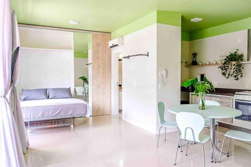 睡床, Lindo loft no centro de Florianopolis. in 伊塔科魯比 睡床, Lindo loft no centro de Florianopolis. in 伊塔科魯比