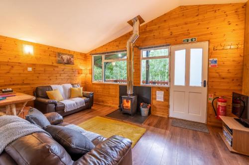 صالة مشتركة/ منطقة التلفزيون, Ancarraig Lodges in Drumnadrochit Town Center صالة مشتركة/ منطقة التلفزيون, Ancarraig Lodges in Drumnadrochit Town Center