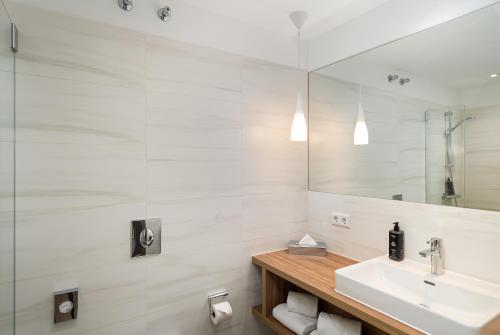Koupelna, elaya hotel regensburg city center ehemals Arthotel ANA Aurel in Řezno Koupelna, elaya hotel regensburg city center ehemals Arthotel ANA Aurel in Řezno