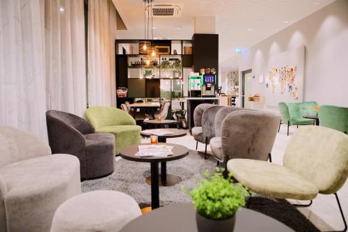 ردهة, Aparthotel Adagio Access Freiburg in فريبابج إم بريسجاو ردهة, Aparthotel Adagio Access Freiburg in فريبابج إم بريسجاو