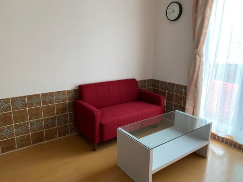 Shared lounge/TV area, コージーペンギンハウス砂川 in Sunagawa Shared lounge/TV area, コージーペンギンハウス砂川 in Sunagawa
