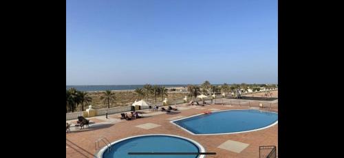 Swimming pool, Amazing view 1-bed condo near Al Hamra Mall Swimming pool, Amazing view 1-bed condo near Al Hamra Mall