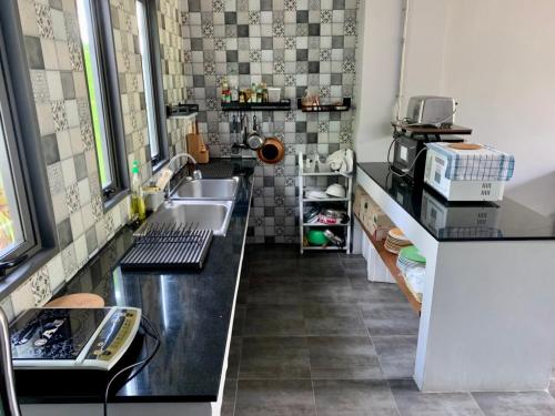 Kitchen, Atomphukethotel in Phuket Airport Kitchen, Atomphukethotel in Phuket Airport
