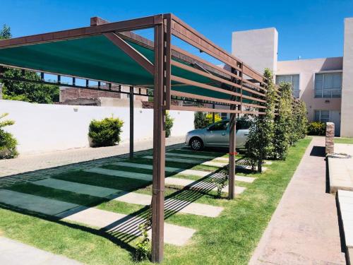 Garden, Hermoso Duplex c/Pileta y Cochera en Consorcio Privado Saavedra in San Juan Garden, Hermoso Duplex c/Pileta y Cochera en Consorcio Privado Saavedra in San Juan