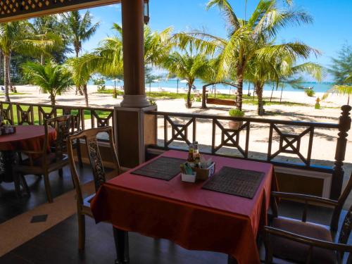 المطعم, منتجع صن سيت بيتش كوه خاو آيلاند (The Sunset Beach Resort Kho Khao Island) in كوء كوء كاو المطعم, منتجع صن سيت بيتش كوه خاو آيلاند (The Sunset Beach Resort Kho Khao Island) in كوء كوء كاو