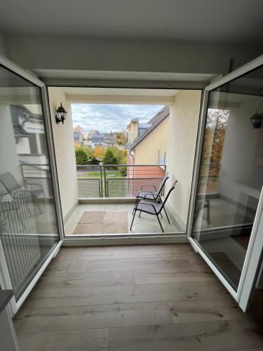 شرفة/ تراس, Neue 45 QM Eigentumswohnung, Balkon, Tiefgarage in Augustusburg شرفة/ تراس, Neue 45 QM Eigentumswohnung, Balkon, Tiefgarage in Augustusburg