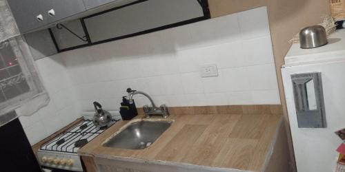 Kitchen, Departamento por temporada in Barrio Parque Luro Kitchen, Departamento por temporada in Barrio Parque Luro