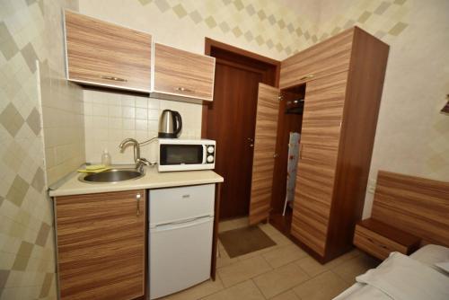 Mutfak, Malon Apartments in Kharkiv Mutfak, Malon Apartments in Kharkiv