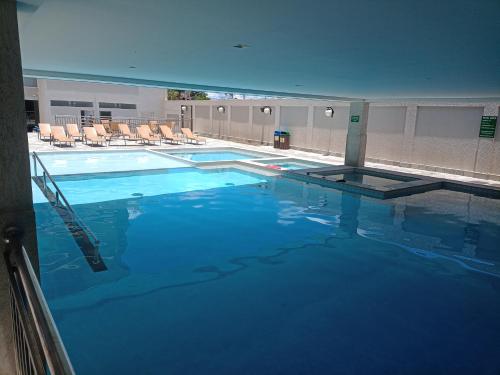 مسبح, Piazza Diroma com acesso gratuito Acqua Park Caldas Novas in Prive das Caldas مسبح, Piazza Diroma com acesso gratuito Acqua Park Caldas Novas in Prive das Caldas