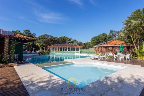 수영장, BZ03 - Casa ampla 4 suítes em Condomínio Clube (BZ03 - Casa ampla 4 suites em Condominio Clube) in 빌라 루이자 수영장, BZ03 - Casa ampla 4 suítes em Condomínio Clube (BZ03 - Casa ampla 4 suites em Condominio Clube) in 빌라 루이자