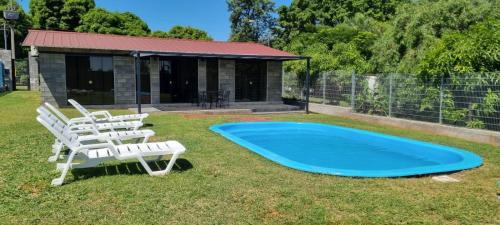 HOMELY STAY Bungalow IV with mit Pool Garden and Patio in Aregua HOMELY STAY Bungalow IV with mit Pool Garden and Patio in Aregua