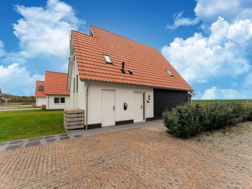 Exterior view, Modern detached holiday home a stone's throw from the beach in Tholen Exterior view, Modern detached holiday home a stone's throw from the beach in Tholen