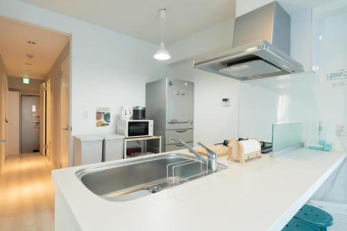 Kitchen, Japan Hinata Hotel 池下駅 1番出口 徒歩2分 1LDK 50平米 8名 near Nagoya University Higashiyama Campus Kitchen, Japan Hinata Hotel 池下駅 1番出口 徒歩2分 1LDK 50平米 8名 near Nagoya University Higashiyama Campus