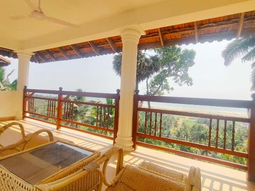陽台/露台, 特拉凡科傳統海灘度假村 (The Travancore Heritage Beach Resort) in 科瓦蘭 陽台/露台, 特拉凡科傳統海灘度假村 (The Travancore Heritage Beach Resort) in 科瓦蘭
