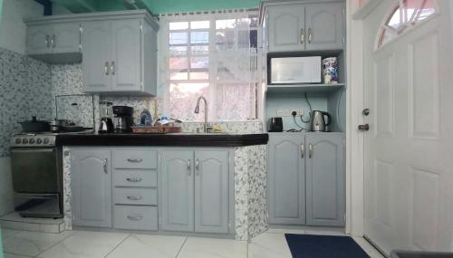 Cozinha, Cozy vacation retreat with free parking in Saint George Cozinha, Cozy vacation retreat with free parking in Saint George