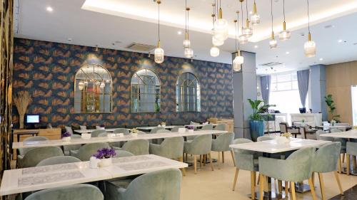Restaurant, The Harvest Hotel Managed by HII in Cabanatuan Restaurant, The Harvest Hotel Managed by HII in Cabanatuan