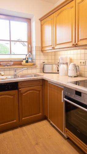 Konyha, Rottach Apartments - Ferienwohnungen am Tegernsee in Rottach-Egern Konyha, Rottach Apartments - Ferienwohnungen am Tegernsee in Rottach-Egern