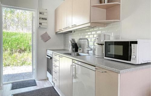 Kitchen, Amazing Apartment In Nex With Sauna in Snogebaek Kitchen, Amazing Apartment In Nex With Sauna in Snogebaek