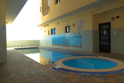 สระว่ายน้ำ, Empire Apartments in มานามา สระว่ายน้ำ, Empire Apartments in มานามา